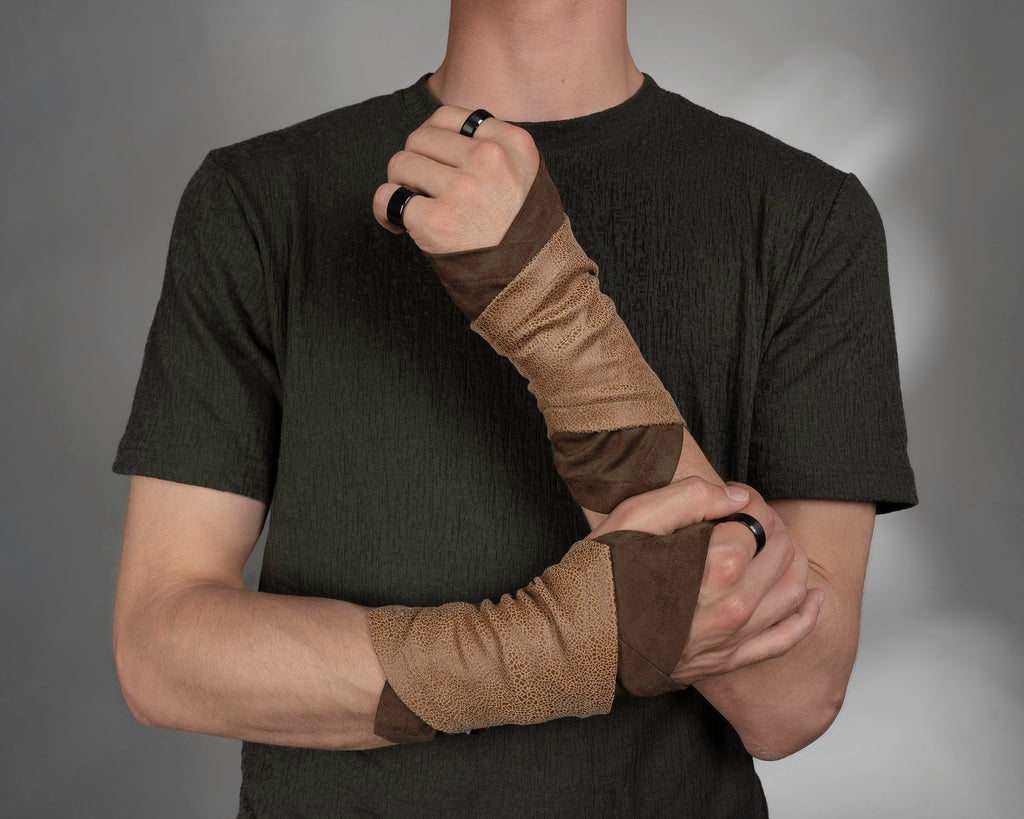 Two-tone brown and beige faux leather bracers on man – ZOLNAR