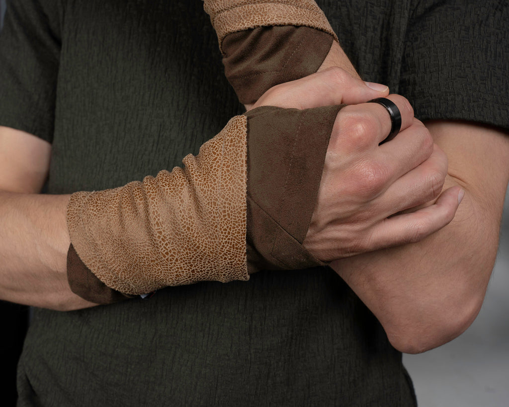 Close-up of beige and brown faux leather armbands on wrist – ZOLNAR