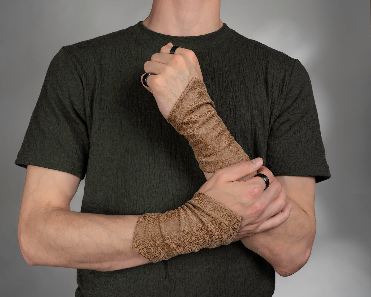 Beige faux leather armband on forearm, front view – ZOLNAR