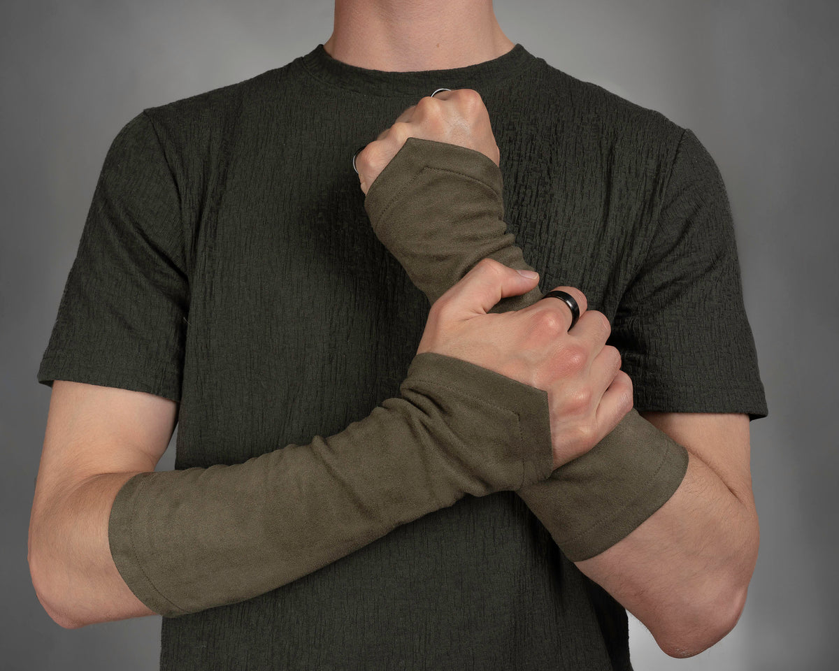 Khaki suede faux leather bracers covering the hands, front view – ZOLNAR