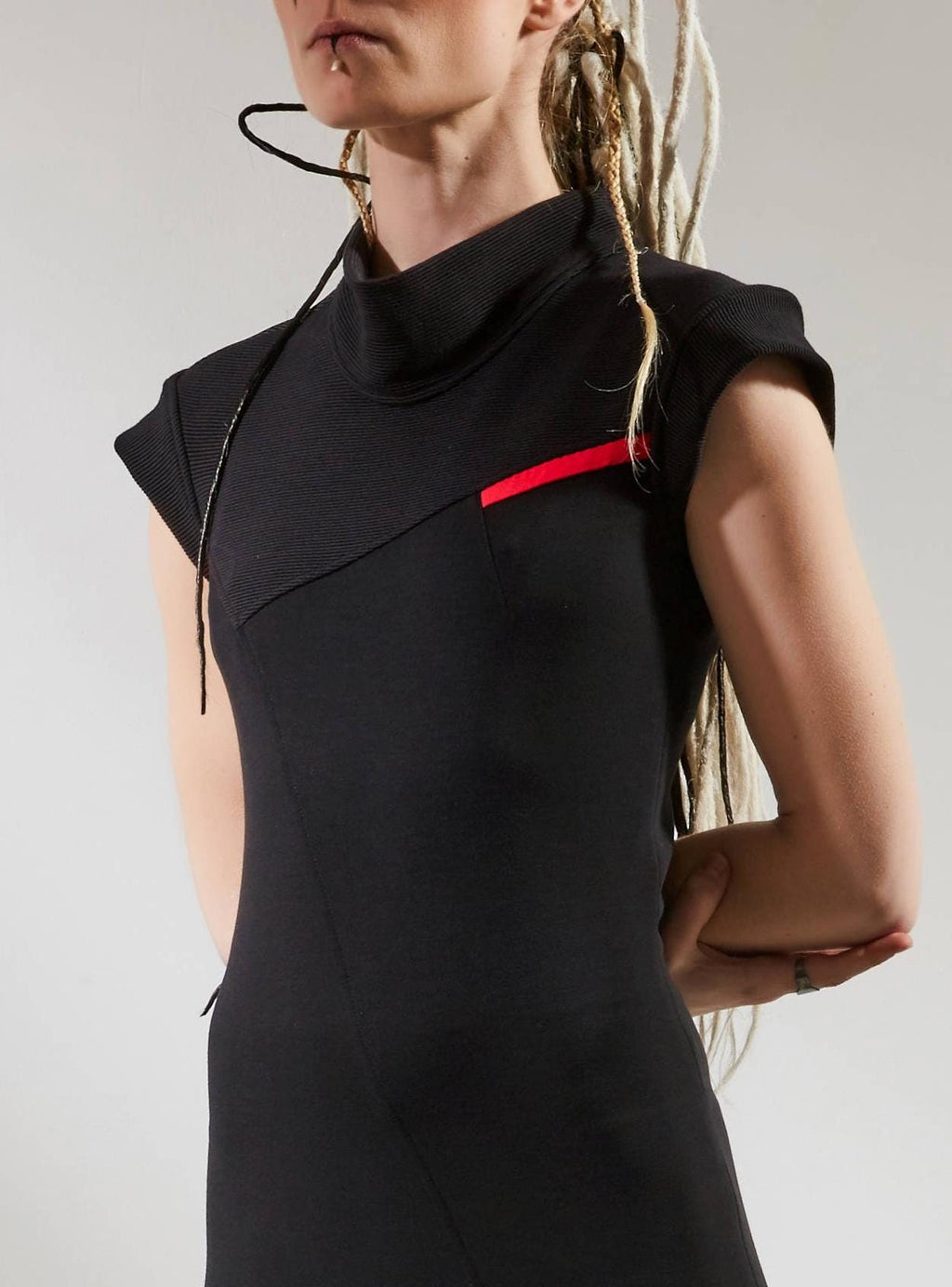 Black minimalist bodycon dress with clean geometric lines — ZOLNAR
