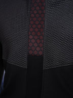 Close-up of a textured fabric with a geometric pattern